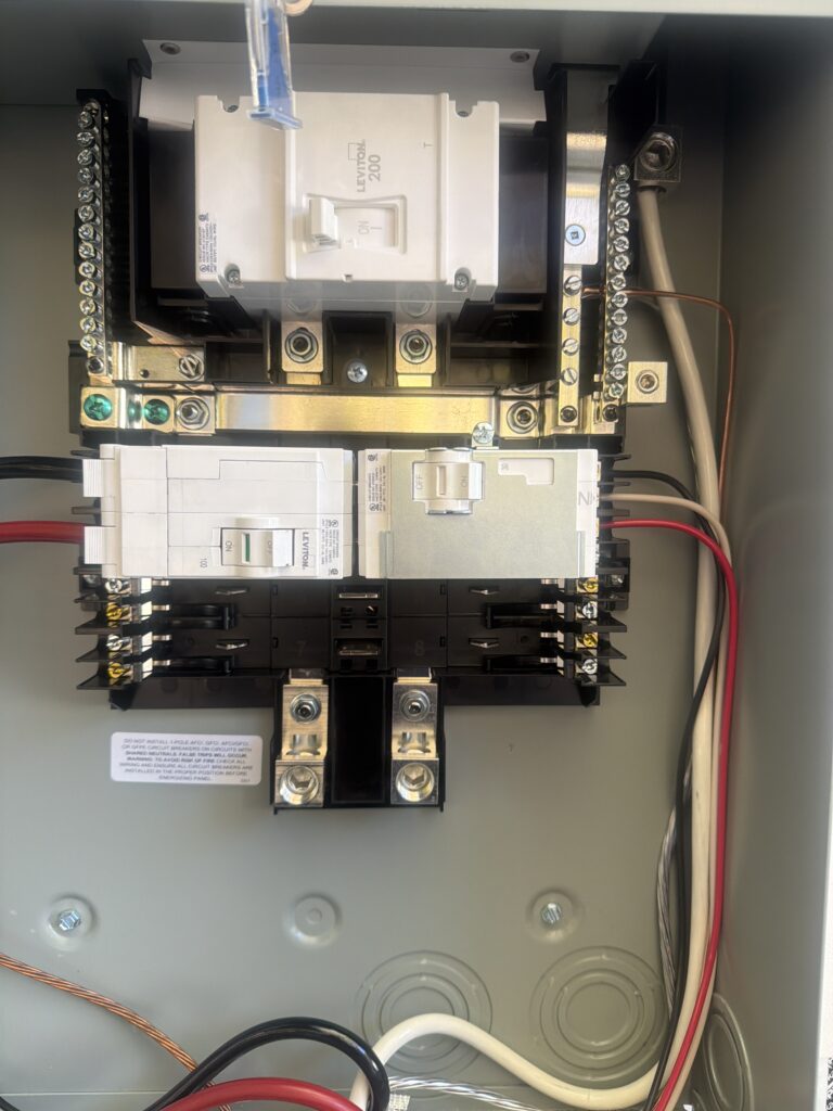 200 amp Leviton meter with 200 amp breaker and generator interlock kit installation by licensed electrician Gorham ME