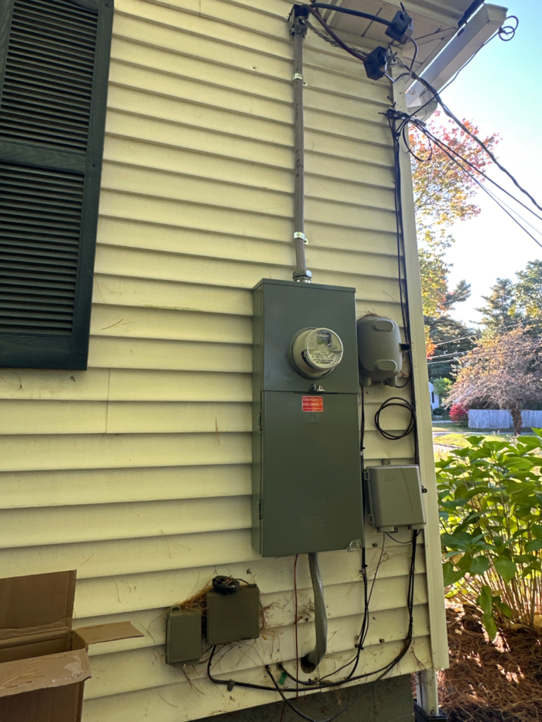 Electrical service disconnect installed on a home in Cumberland, Maine