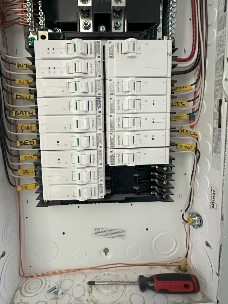 New 100 amp panel installation for home addition by licensed electrician Brunswick ME
