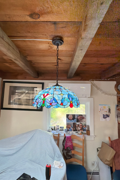 Lighting installation in Maine — new glass chandelier installed in dining room to replace outdated fixture