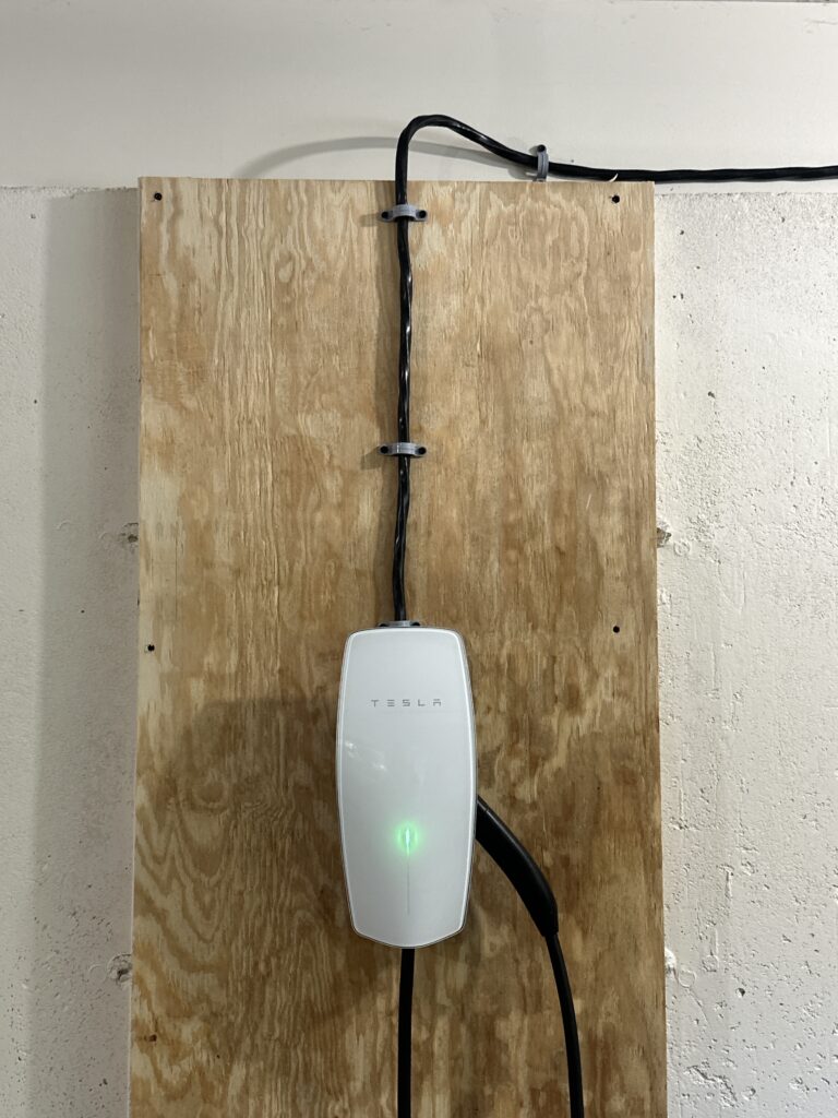 EV charger installation in Maine new Tesla Wall Connector and dedicated circuit by BANN Home Electrical