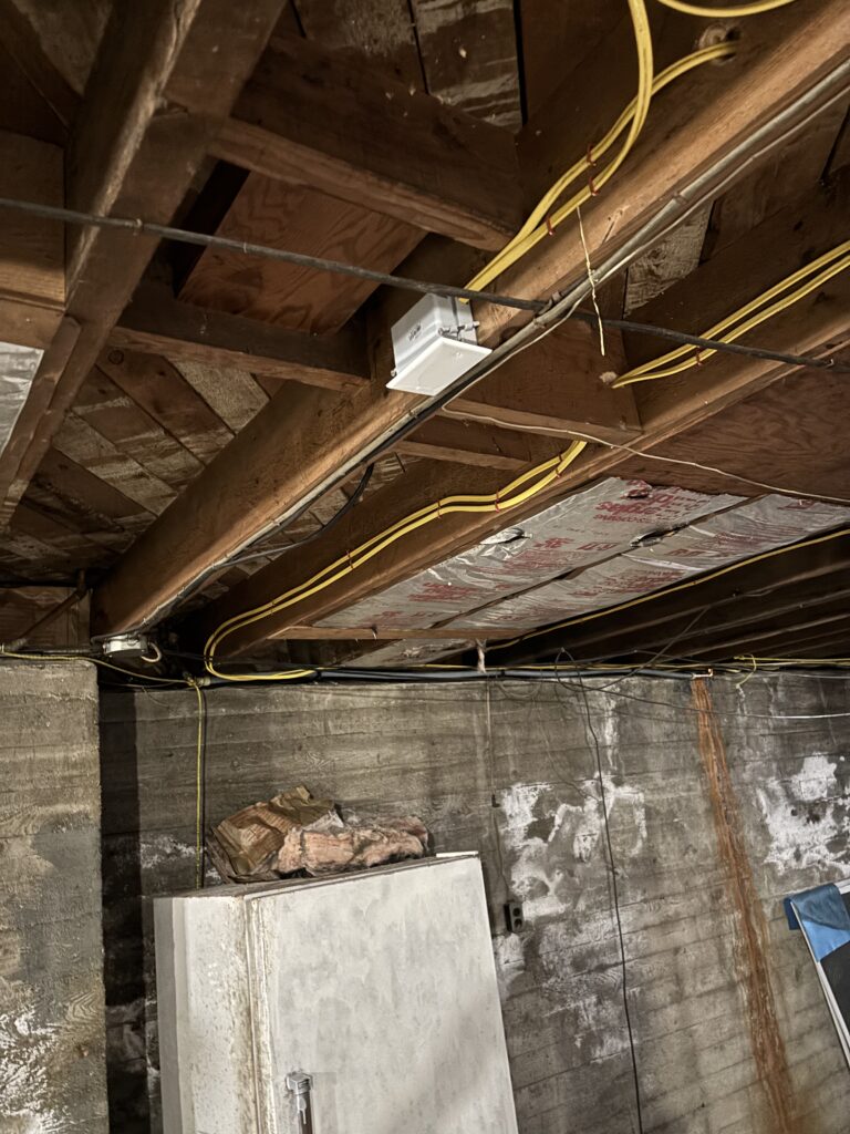 New wiring replacing ungrounded electrical system by licensed electrician Windham ME